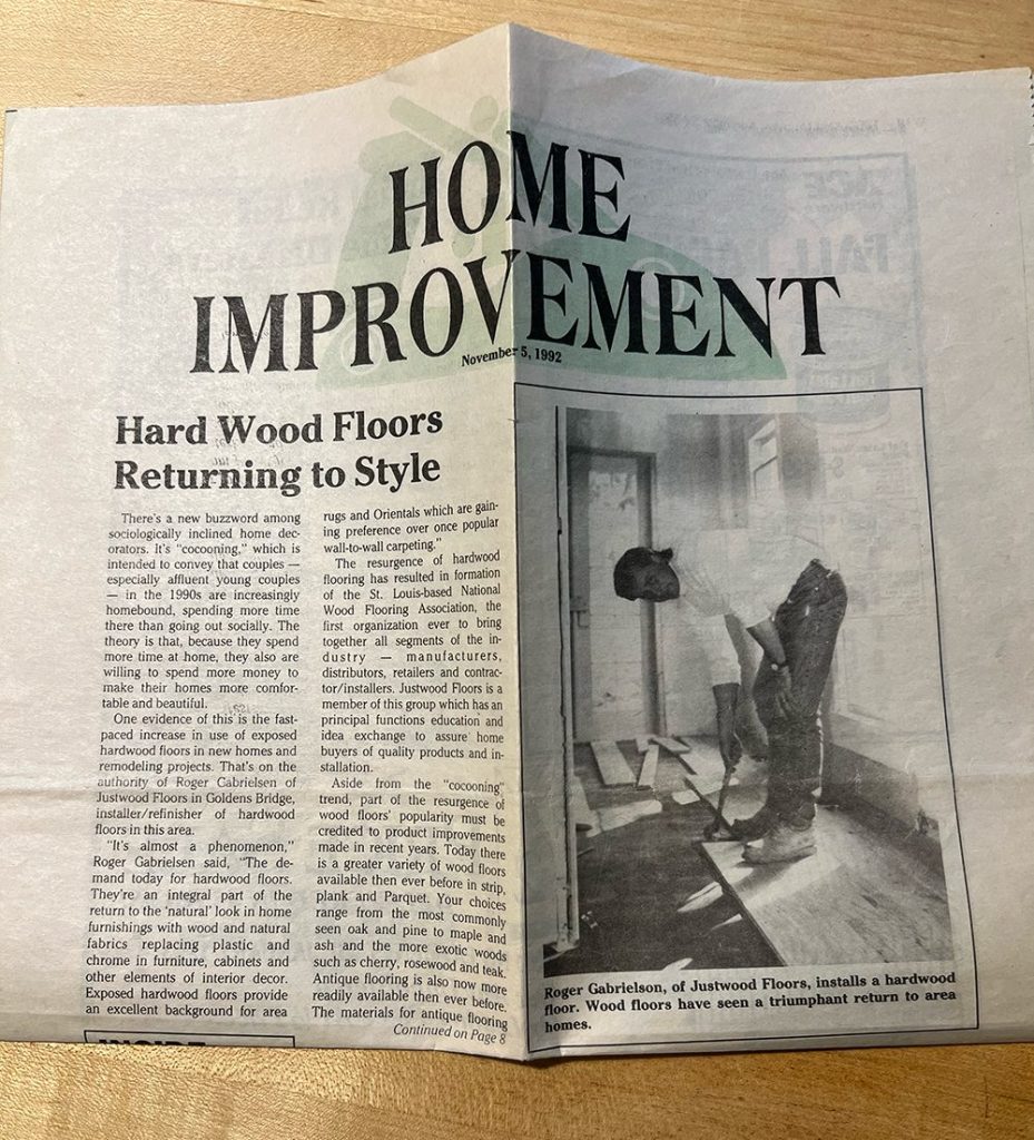 Newspaper article, Hard Wood Floors Returning to Style, showing Roger Gabrielsen of Justwood Floors installing a hardwood floor